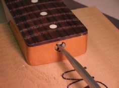 adjusting truss rod